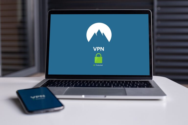 laptop and mobile phone protected by a VPN service