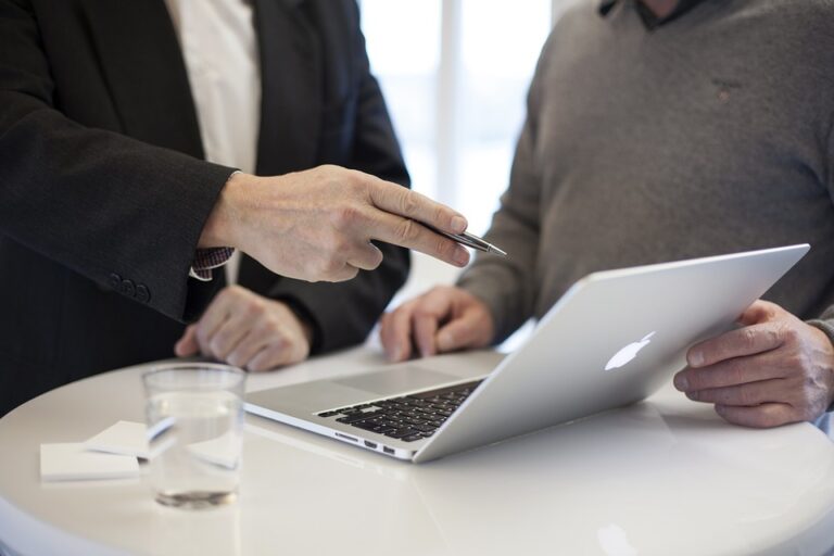 Businessman consulting with client