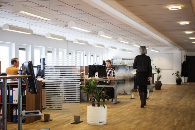 small business office space with employees working at their desks