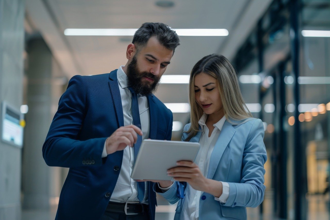 businessman delegating a task to a team member