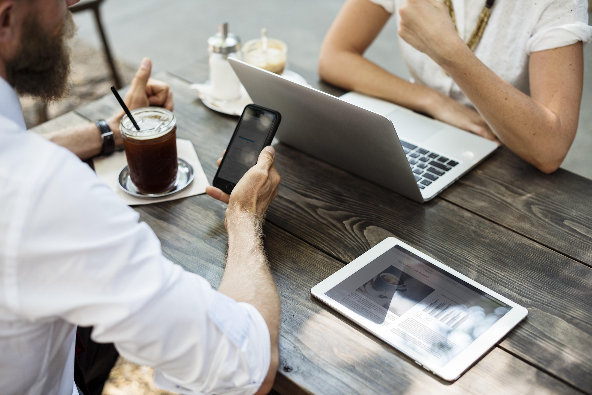 two people having a casual business meeting at a coffe shop